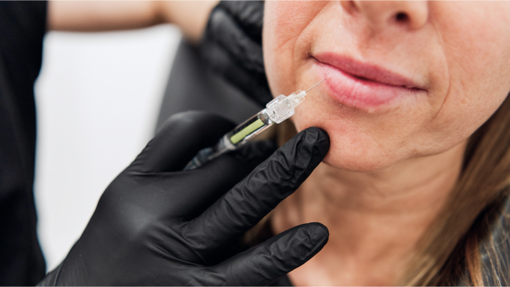 a young woman injecting botox