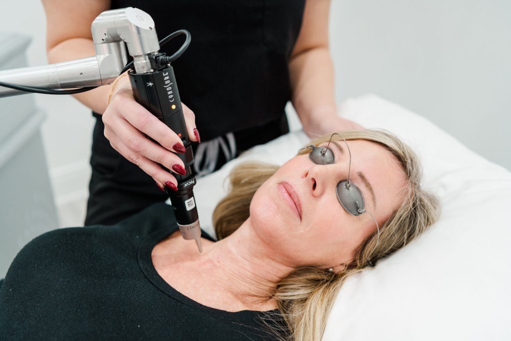 A woman receiving a pigmentation treatment.